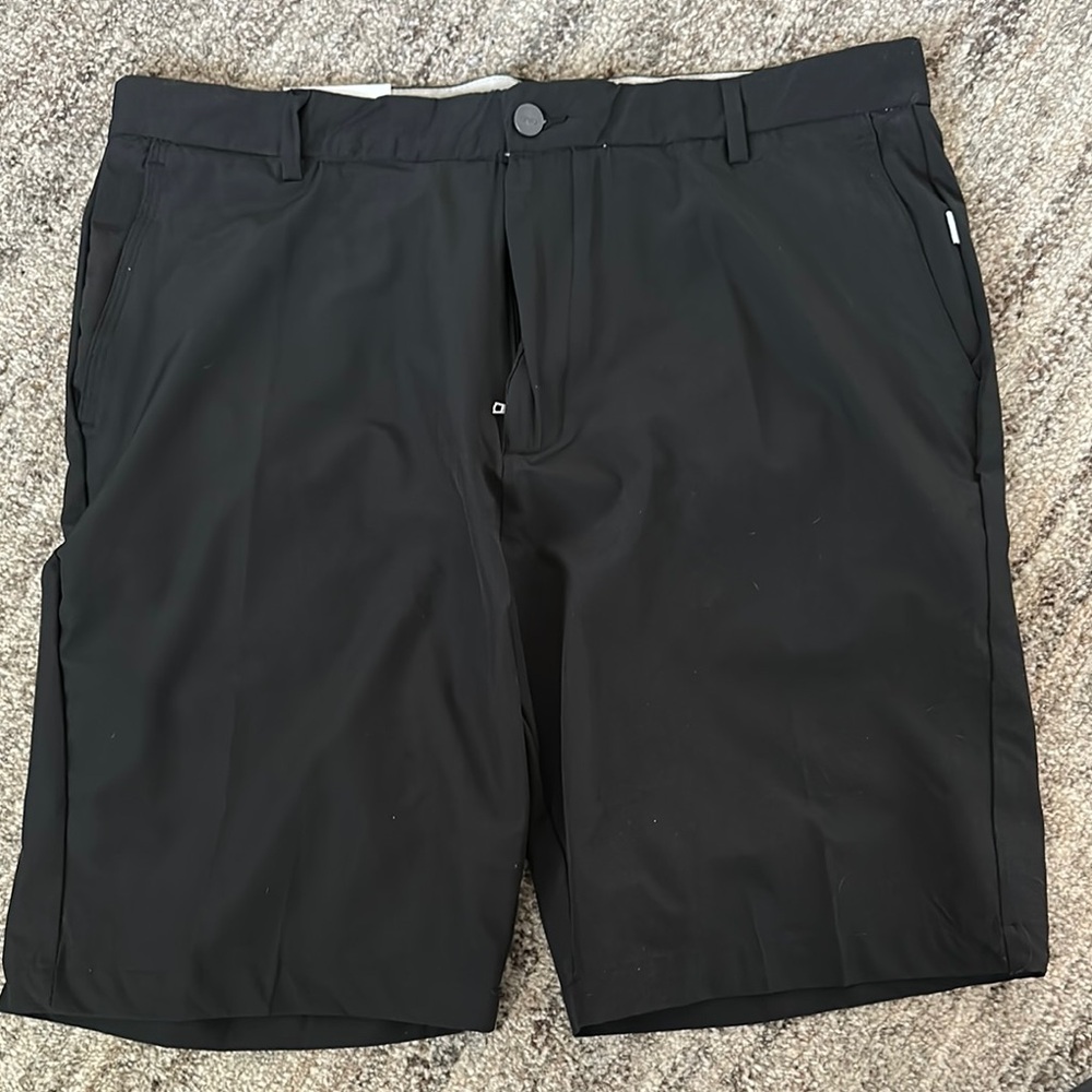 Onia Black Flat Front Shorts with Modern Style